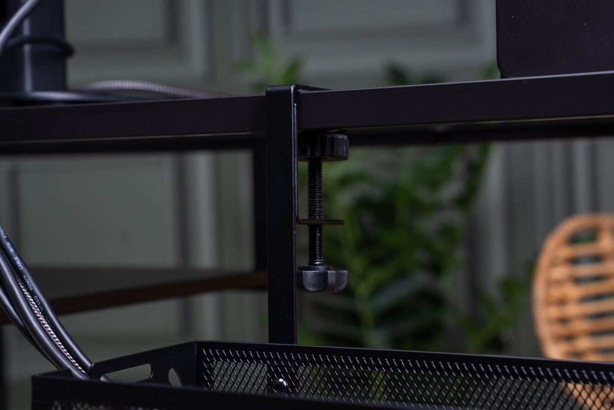 Place a pad on each clamp and slide it over the back edge of your desk.